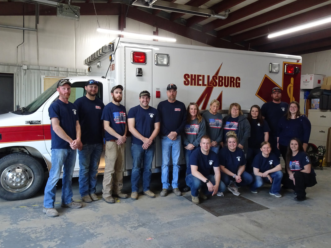 Shellsburg EMS team and truck